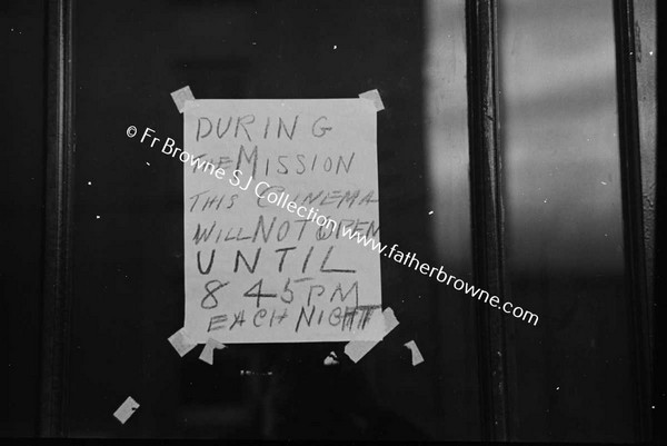 MISSION NOTICE ON CINEMA DOOR